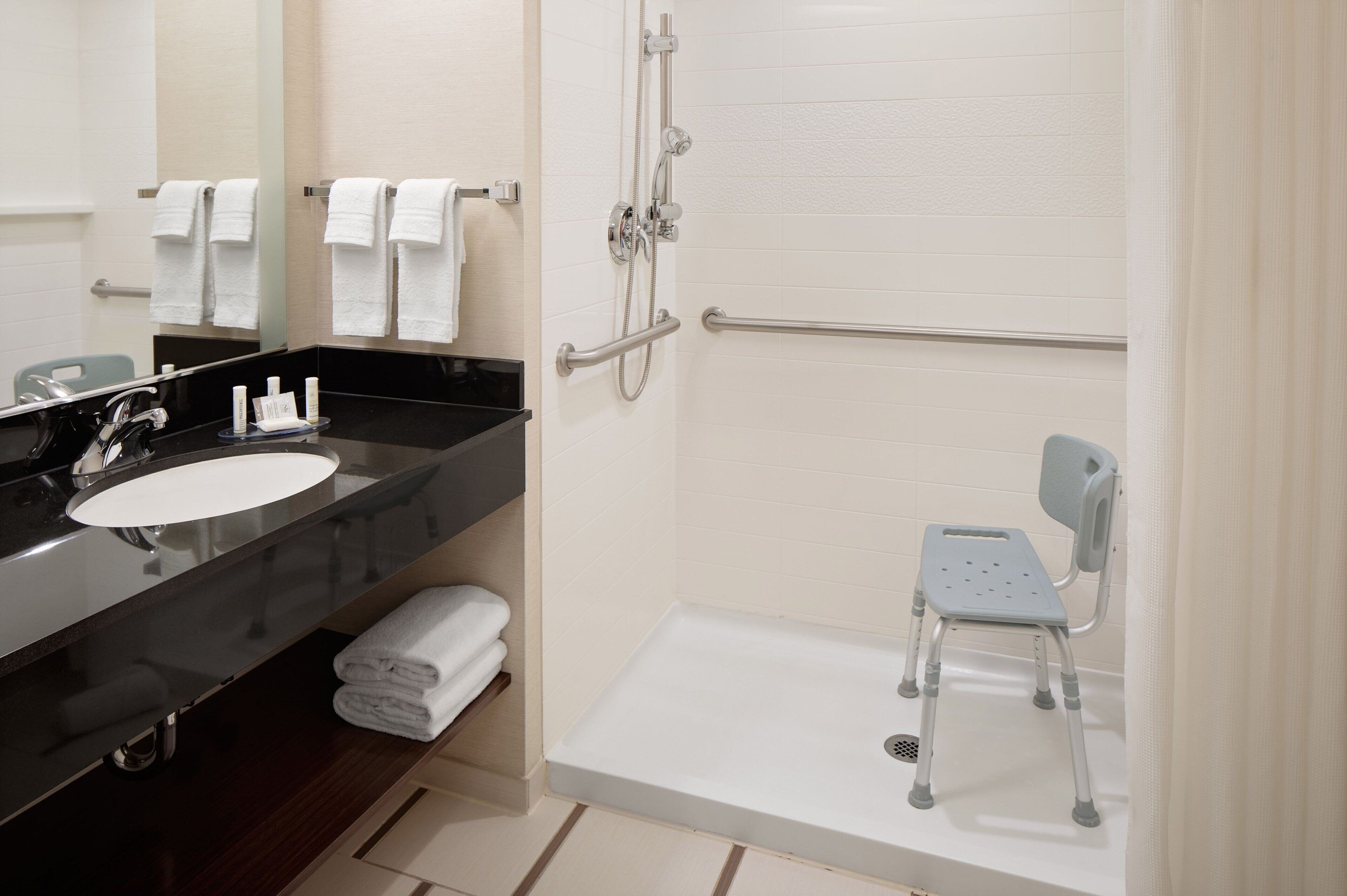 hair dryer, towels, soap, shampoo