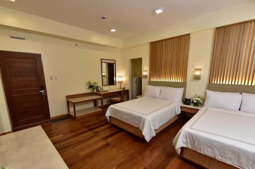 Mabuhay Suite | Caja de seguridad en la habitación, wifi gratis y ropa de cama