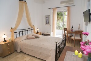 Apartment, 1 Bedroom, Garden View (3 Adults) | Premium bedding, in-room safe, blackout drapes, iron/ironing board - Soultana Rooms & Apartments (Milos)