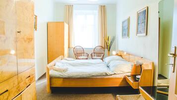 Desk, blackout drapes, iron/ironing board, rollaway beds