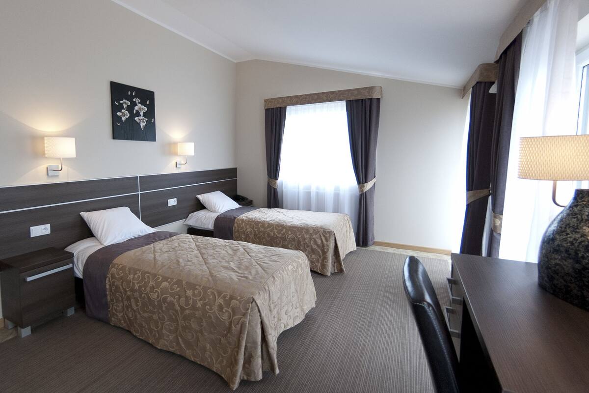 Premium bedding, individually furnished, desk, blackout curtains