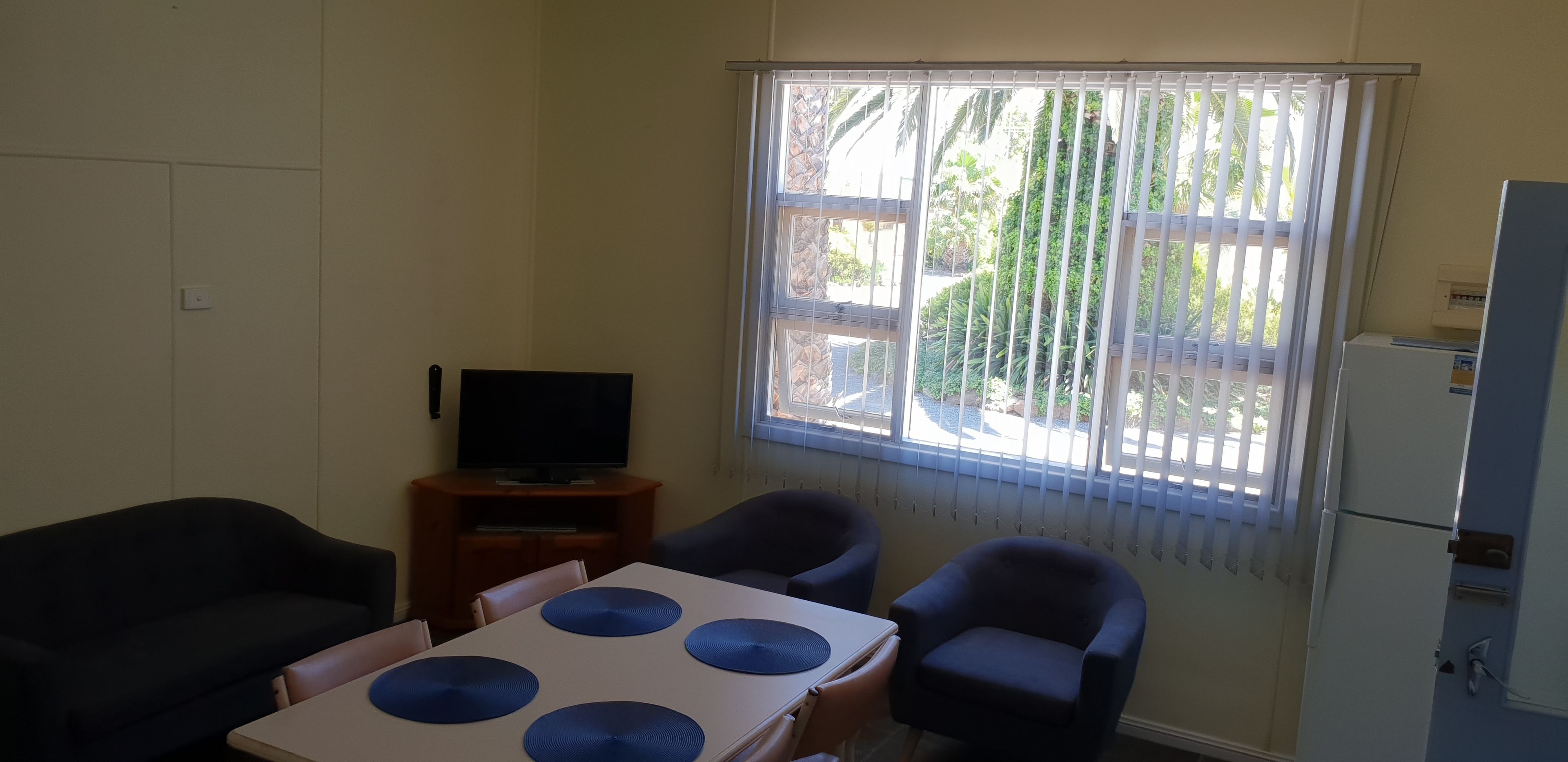 Two Bedroom Apartment - 1 Queen, 1 Double & 2 Single Beds | Living area | LED TV, DVD player