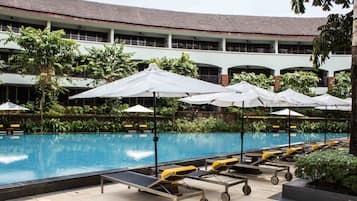 2 outdoor pools, pool umbrellas, pool loungers
