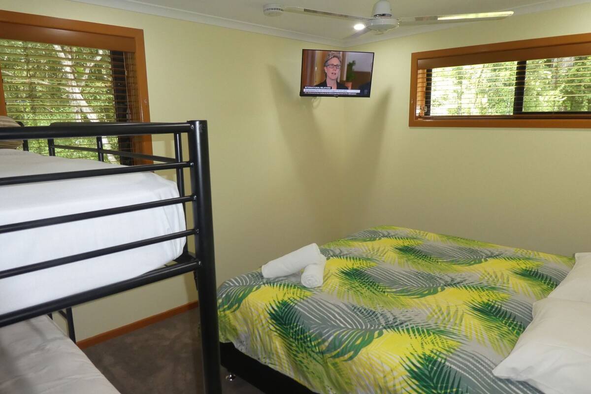 4 bedrooms, blackout drapes, iron/ironing board, WiFi