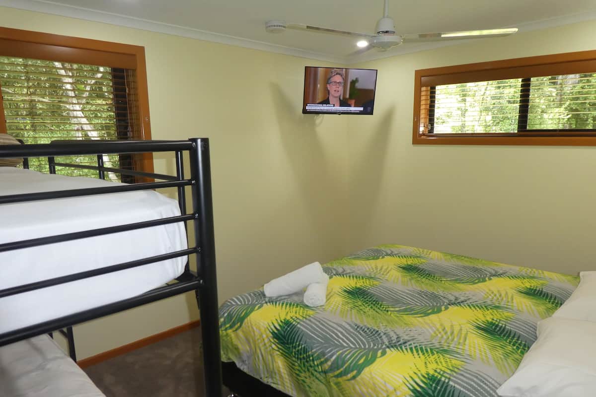 Appartamento Executive, 2 camere da letto, vista giardino | 4 camere, tende oscuranti, ferro/asse da stiro, Wi-Fi (a pagamento)