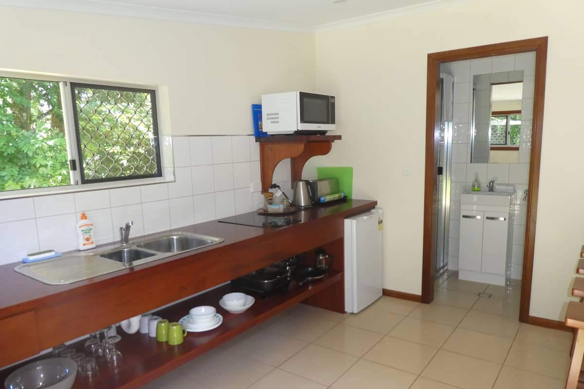 Suite monolocale Superior, 1 camera da letto, vista giardino | Cucina privata | Seggiolone