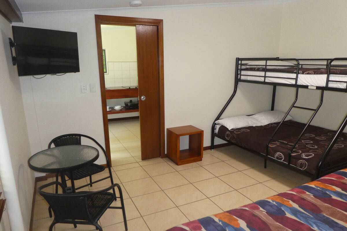 4 bedrooms, blackout drapes, iron/ironing board, WiFi