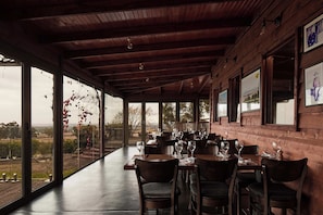 Breakfast, lunch, dinner served; local cuisine, al fresco dining