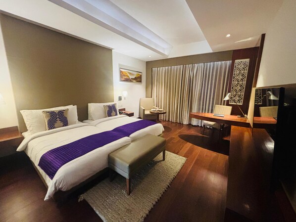 Premium bedding, in-room safe, individually decorated