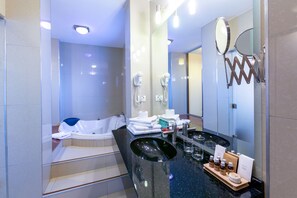 Golden Suite | Bathroom | Rainfall showerhead, free toiletries, hair dryer, bathrobes