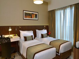Ropa de cama de alta calidad, colchones Select Comfort, minibar