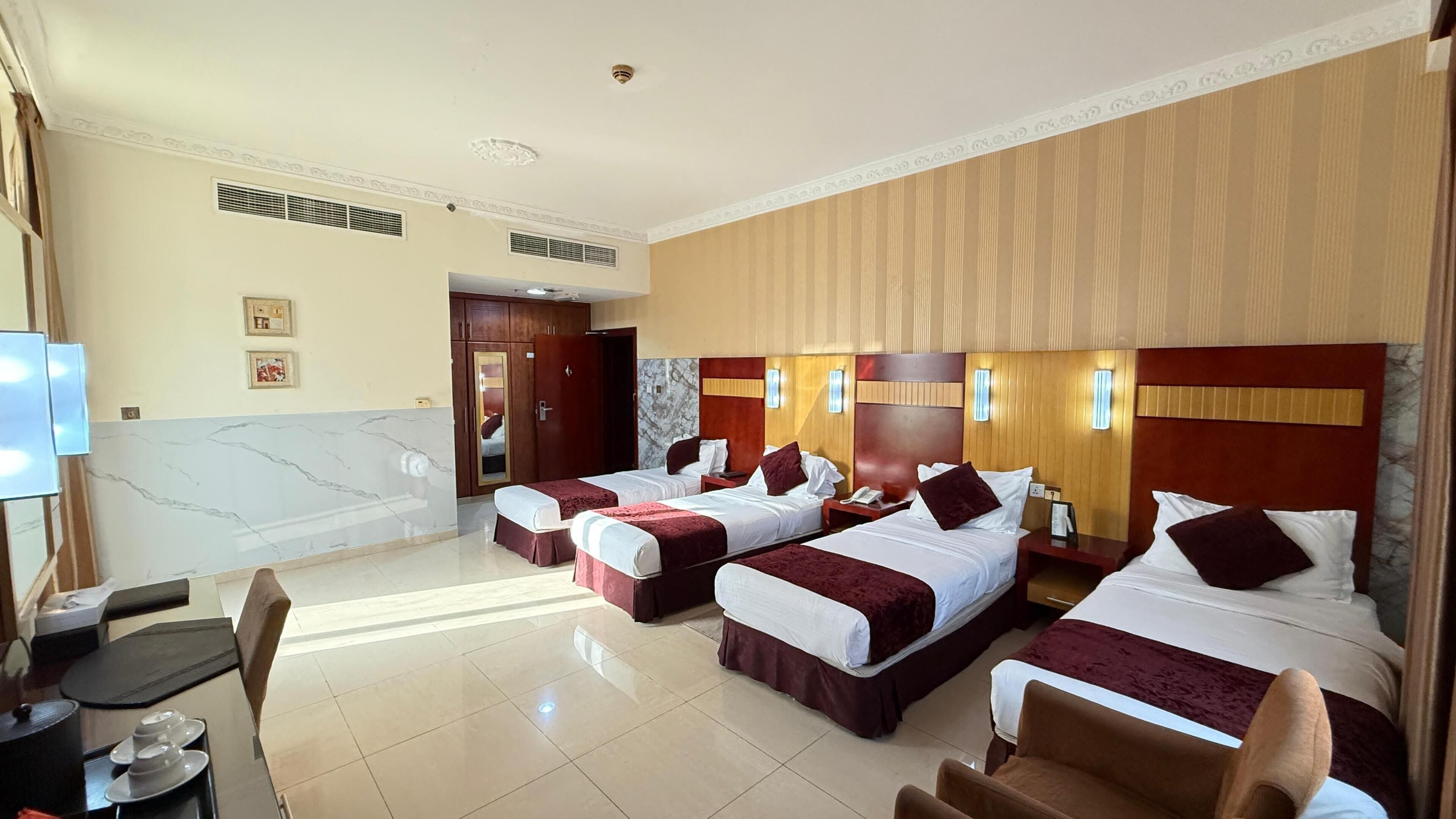 Quadruple Room | Minibar, in-room safe, desk, soundproofing