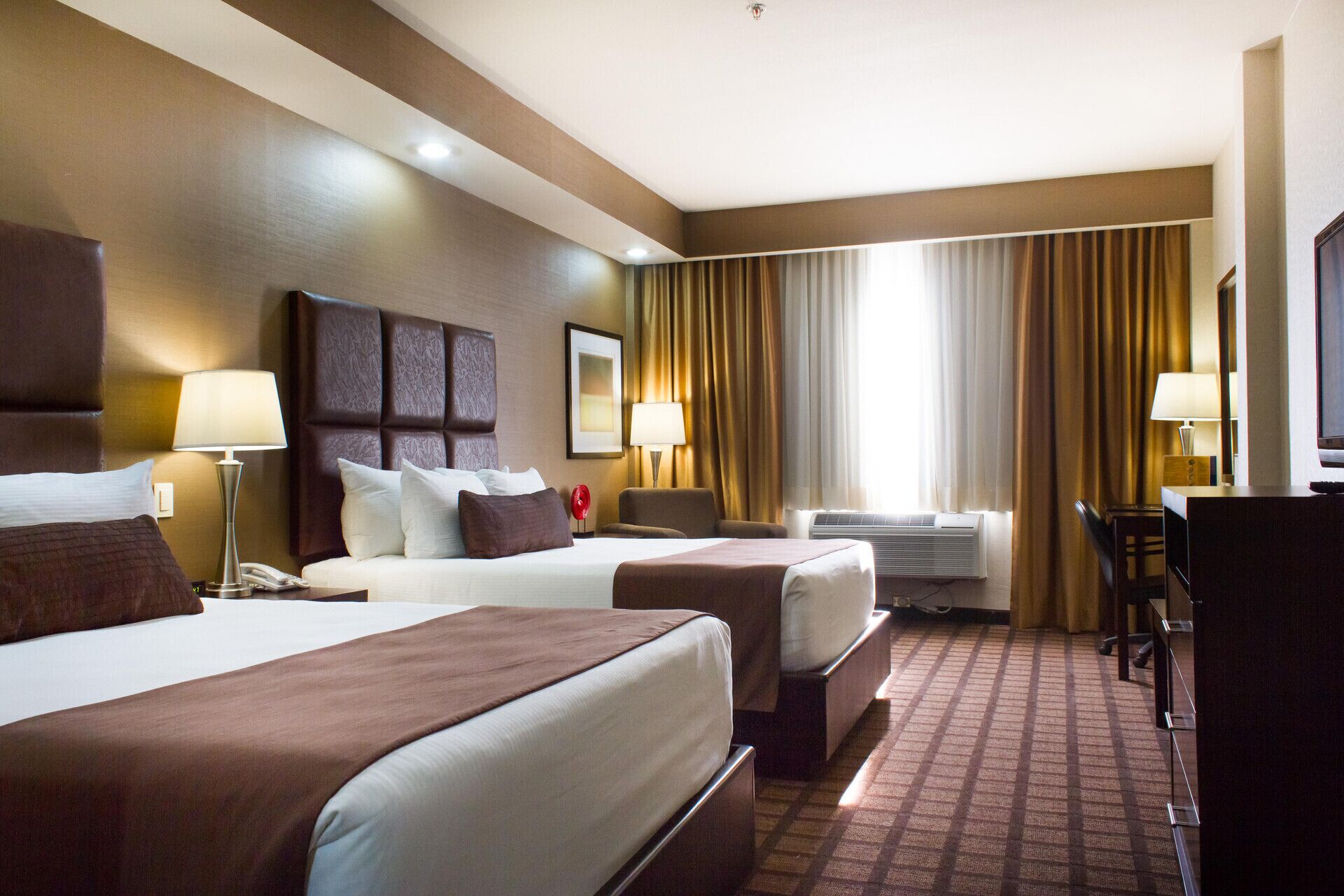 Premium bedding, down duvets, minibar, in-room safe