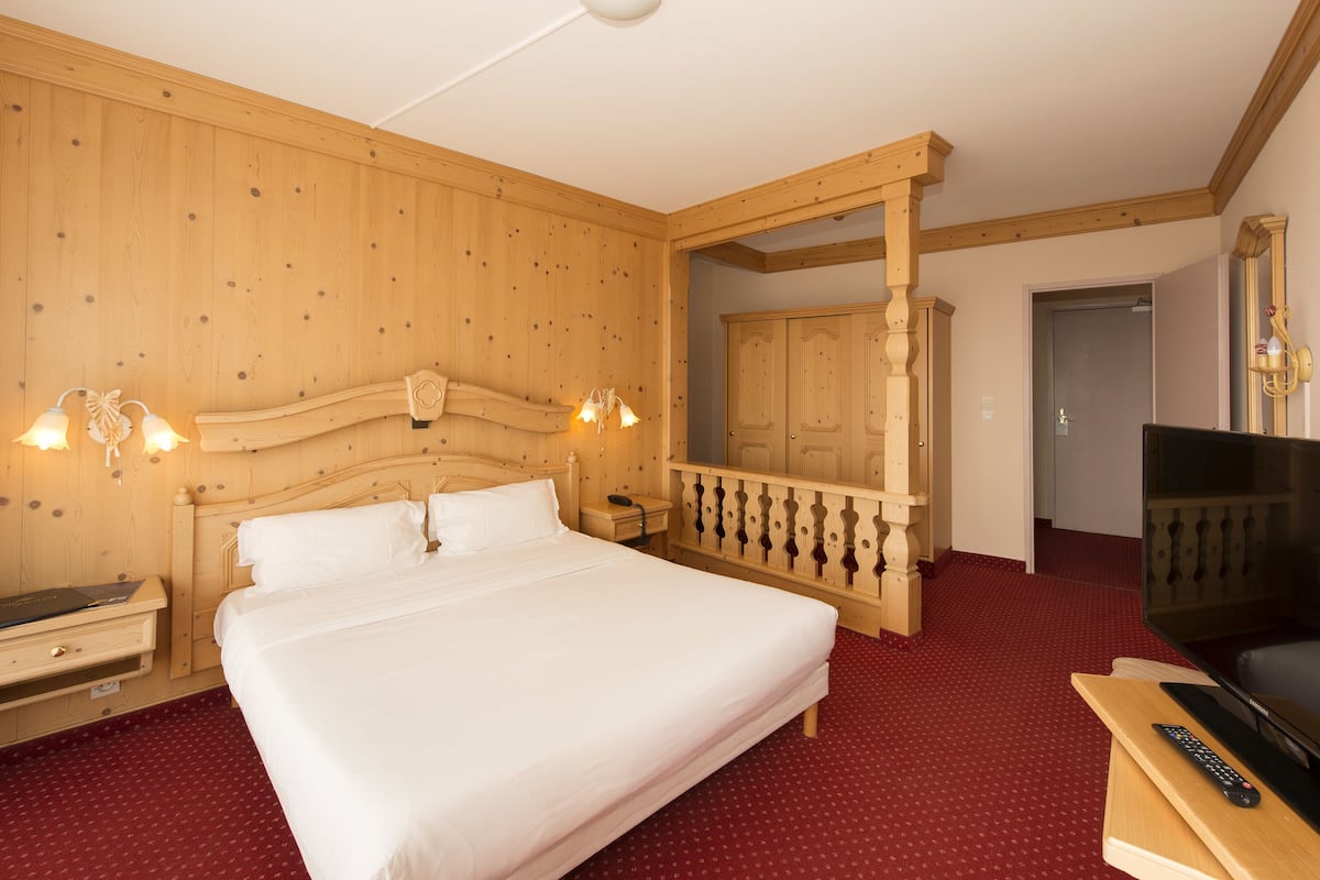 Suite Deluxe, balcón | Ropa de cama de alta calidad, wifi gratis, decoración individual