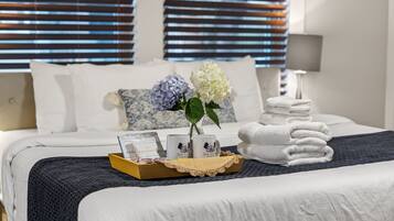 Deluxe Quadruple Room, Multiple Beds | Egyptian cotton sheets, premium bedding, memory foam beds