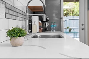 Deluxe Studio, Private Bathroom (Lily Room) | Private kitchenette | Coffee/tea maker, cookware/dishes/utensils, paper towels