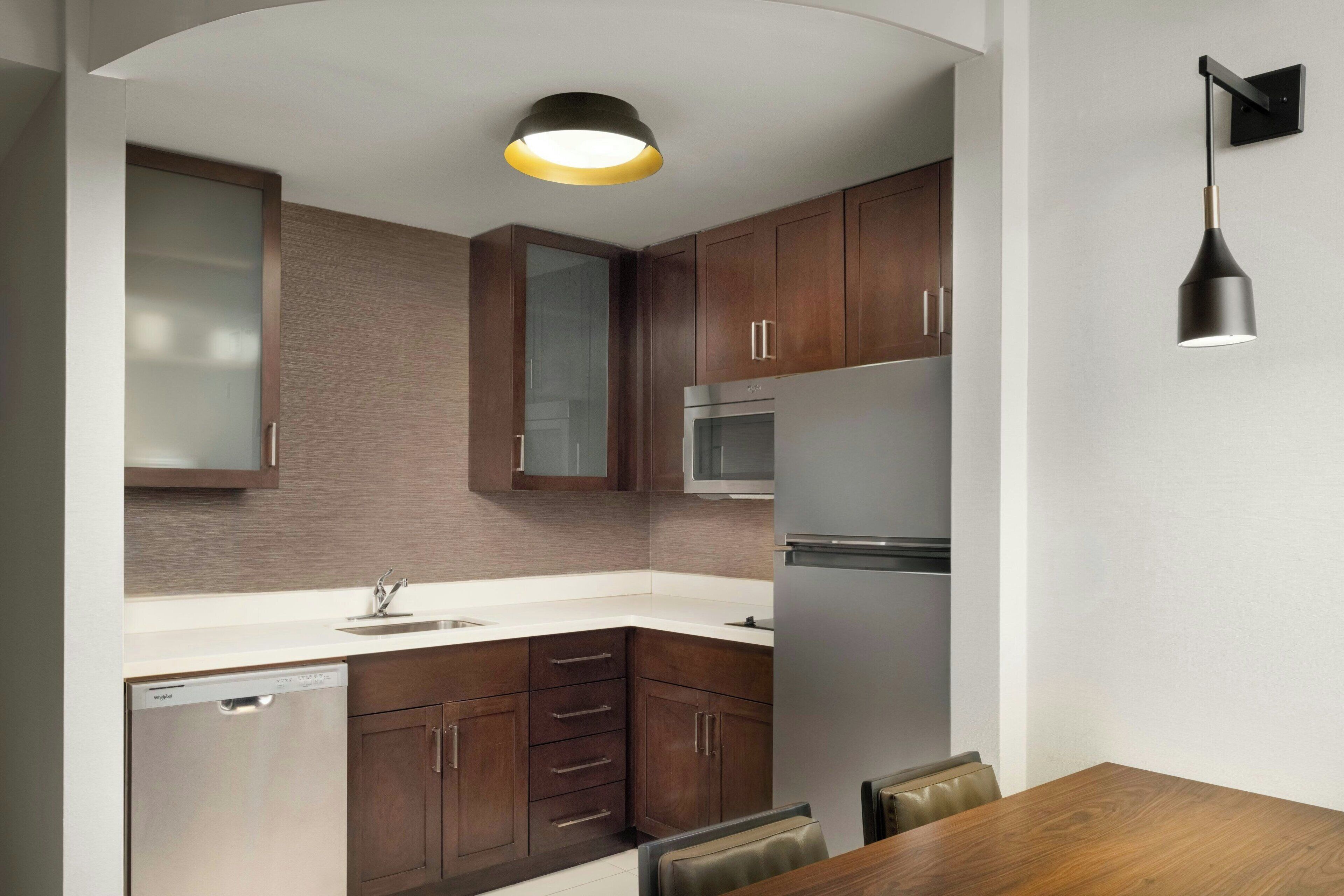 suite, 1 bedroom, city view | in-room safe, desk, iron/ironing board, free cots/infant beds