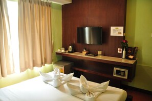 Quarto casal ou duplo superior | Área de estar | TV LCD