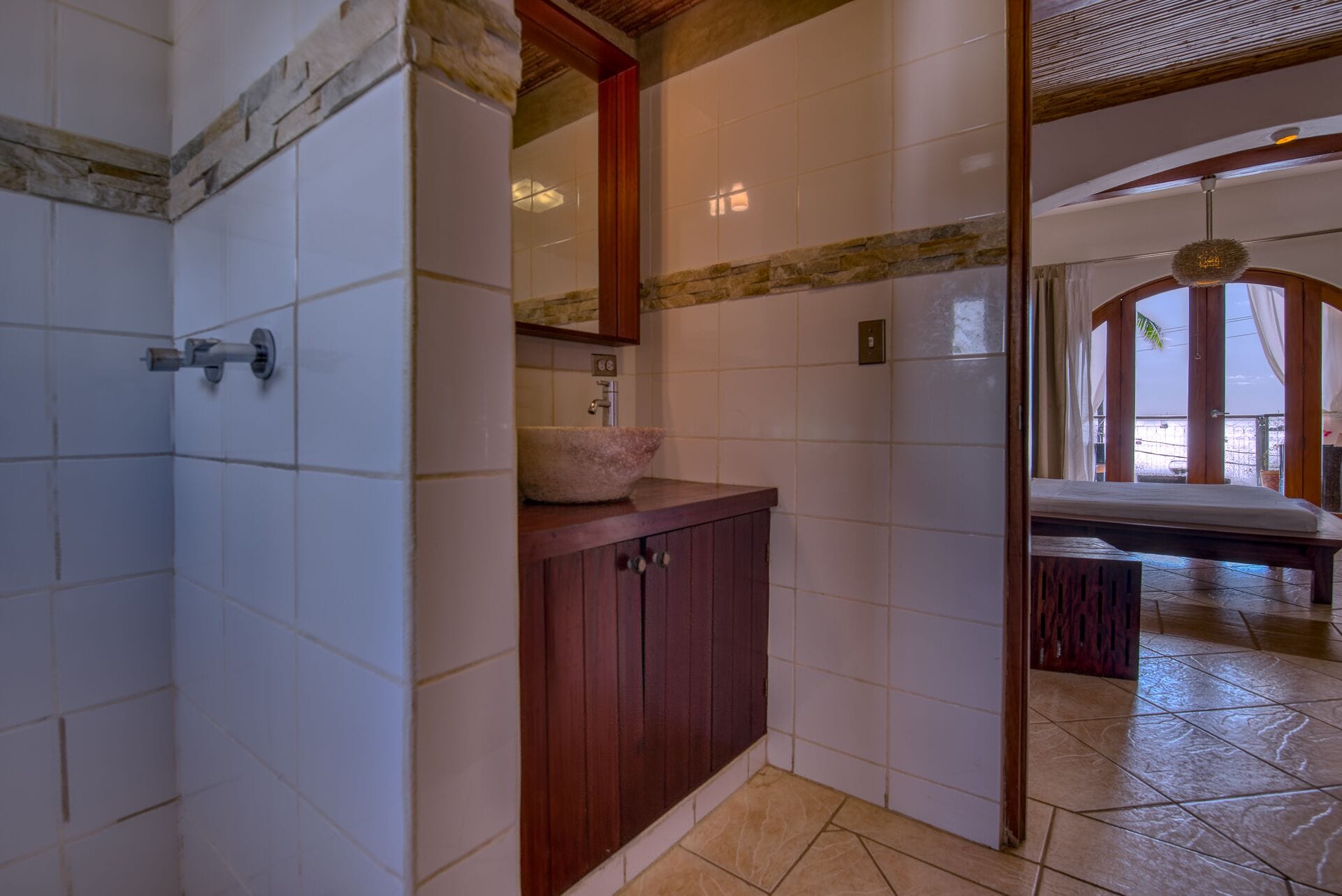 deluxe room, 1 queen bed | bathroom | shower, rainfall showerhead, free toiletries, hair dryer