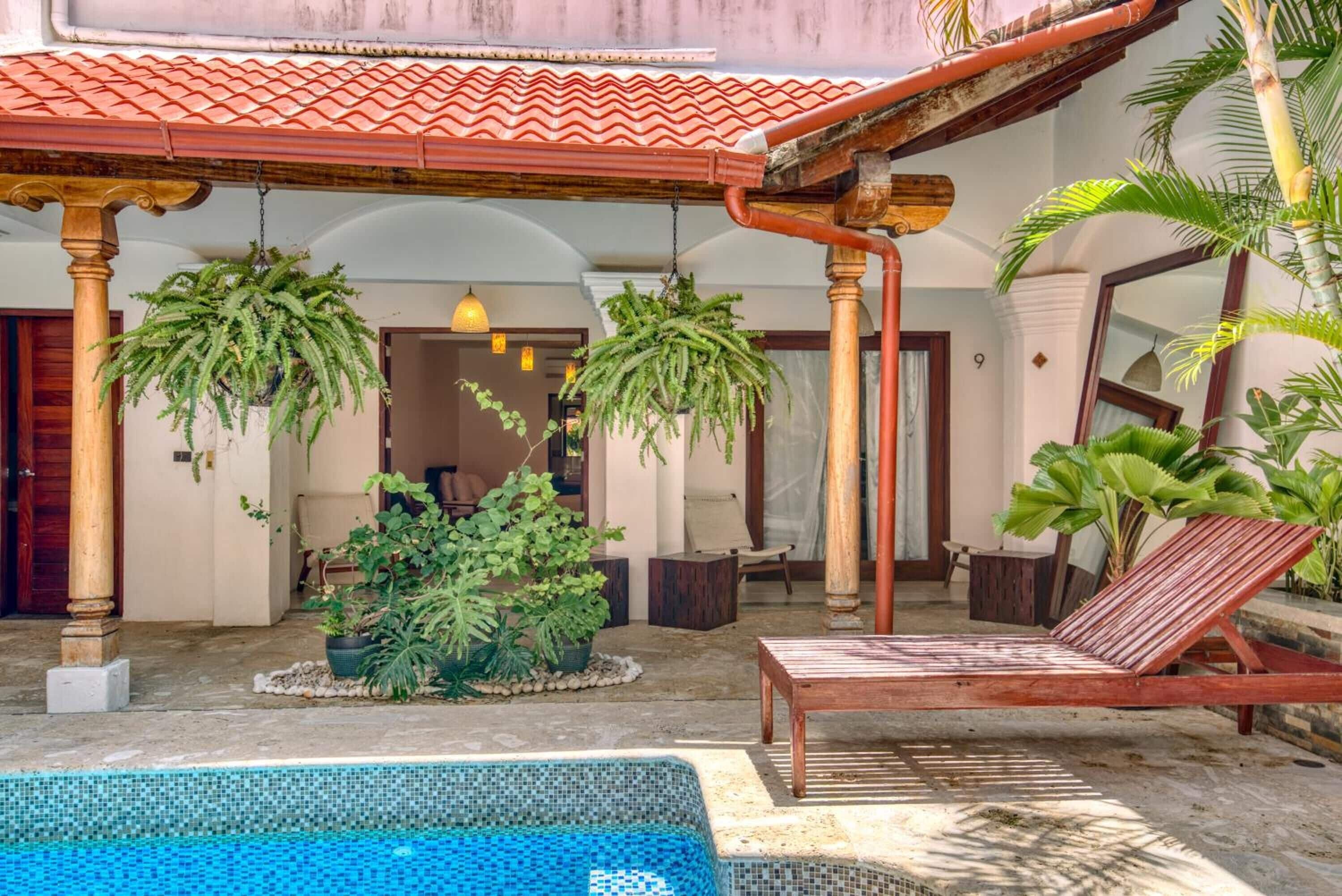 outdoor pool, open 1 pm to 9 pm, pool loungers