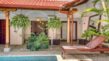 Outdoor pool, open 1 PM to 9 PM, sun loungers