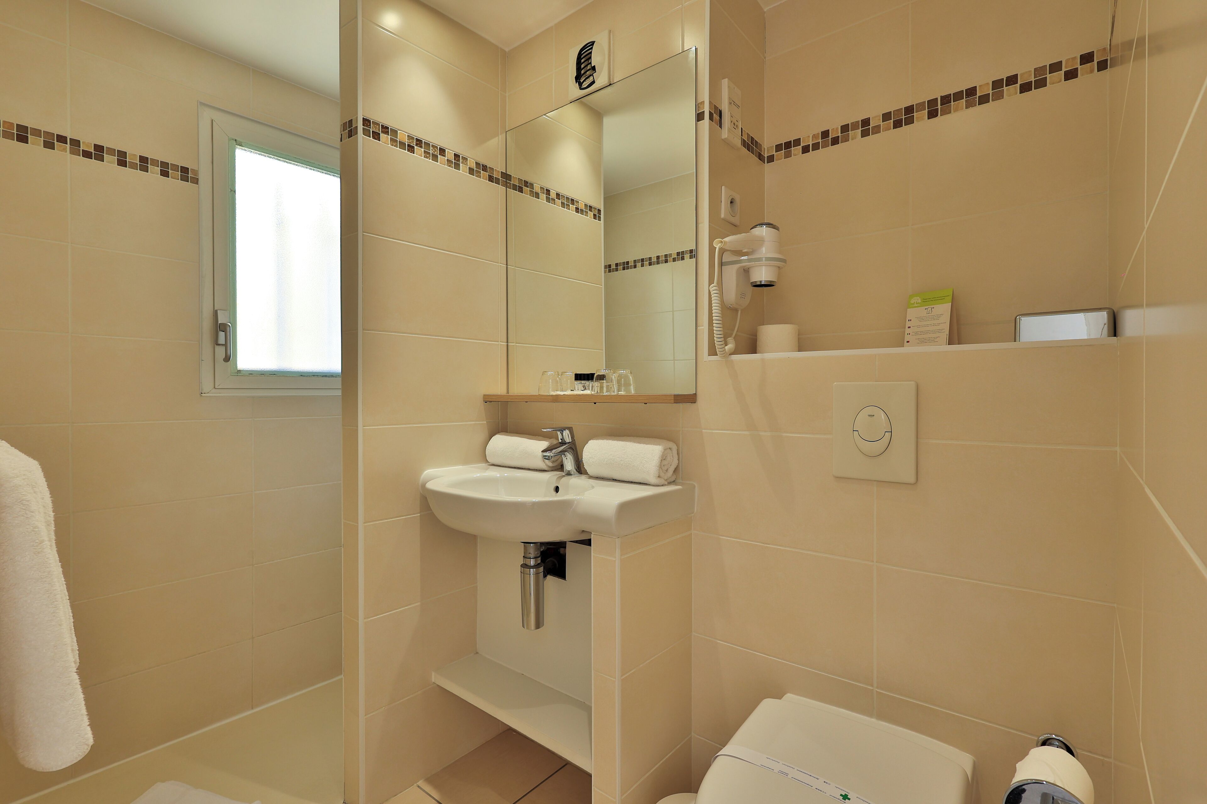 superior room | bathroom | hair dryer, towels