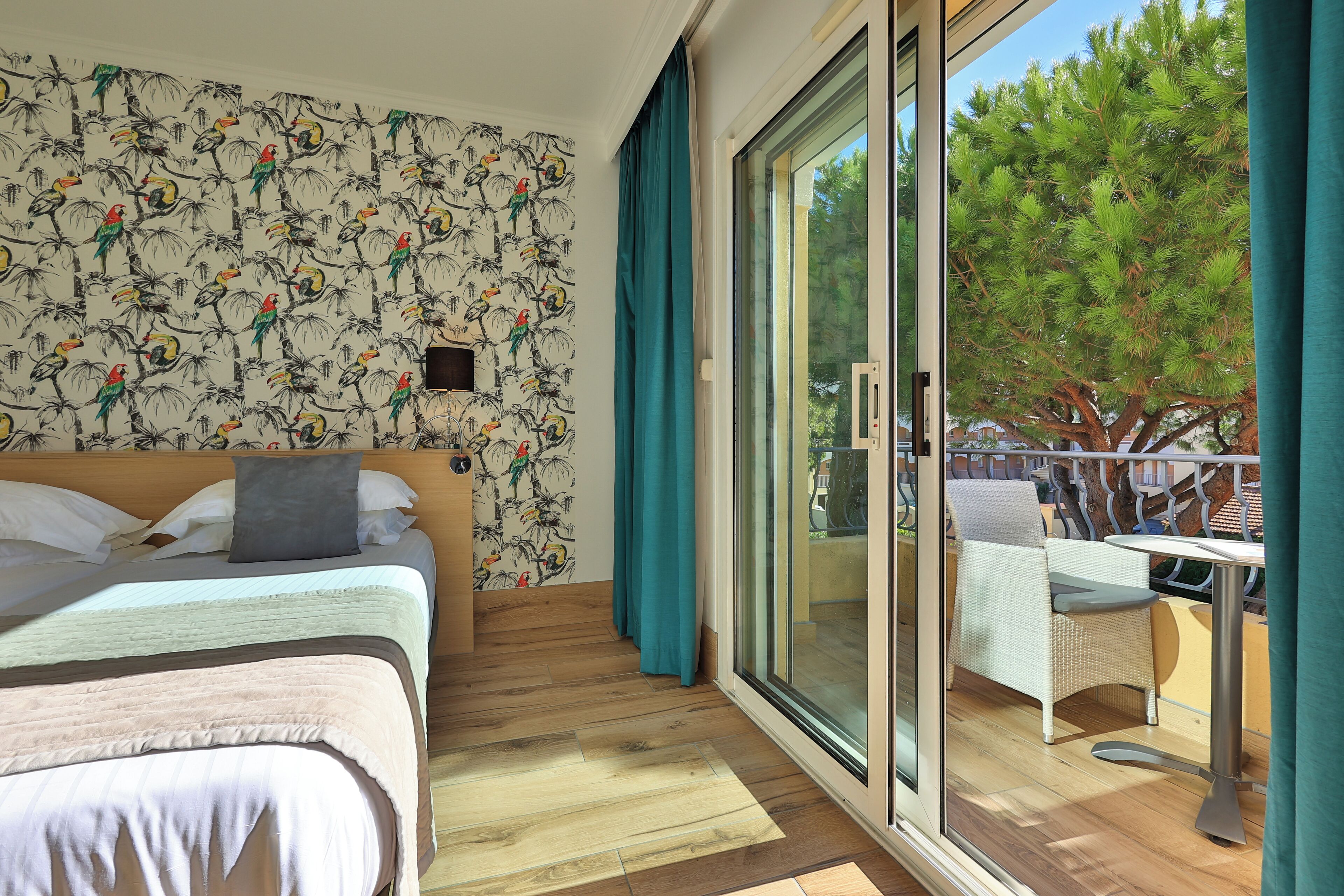 superior room | minibar, in-room safe, desk, iron/ironing board