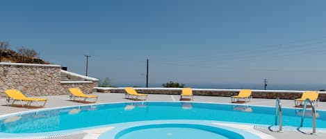 Outdoor pool, open 8:00 AM to 10:00 PM, sun loungers