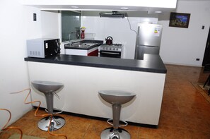 Full-size fridge, microwave, coffee/tea maker