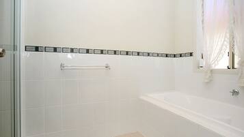 Four Bedroom Holiday House | Bathroom | Separate tub and shower, deep soaking tub, rainfall showerhead