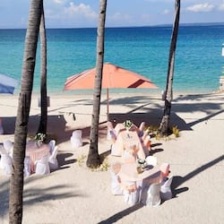 On the beach, white sand, sun-loungers, beach umbrellas