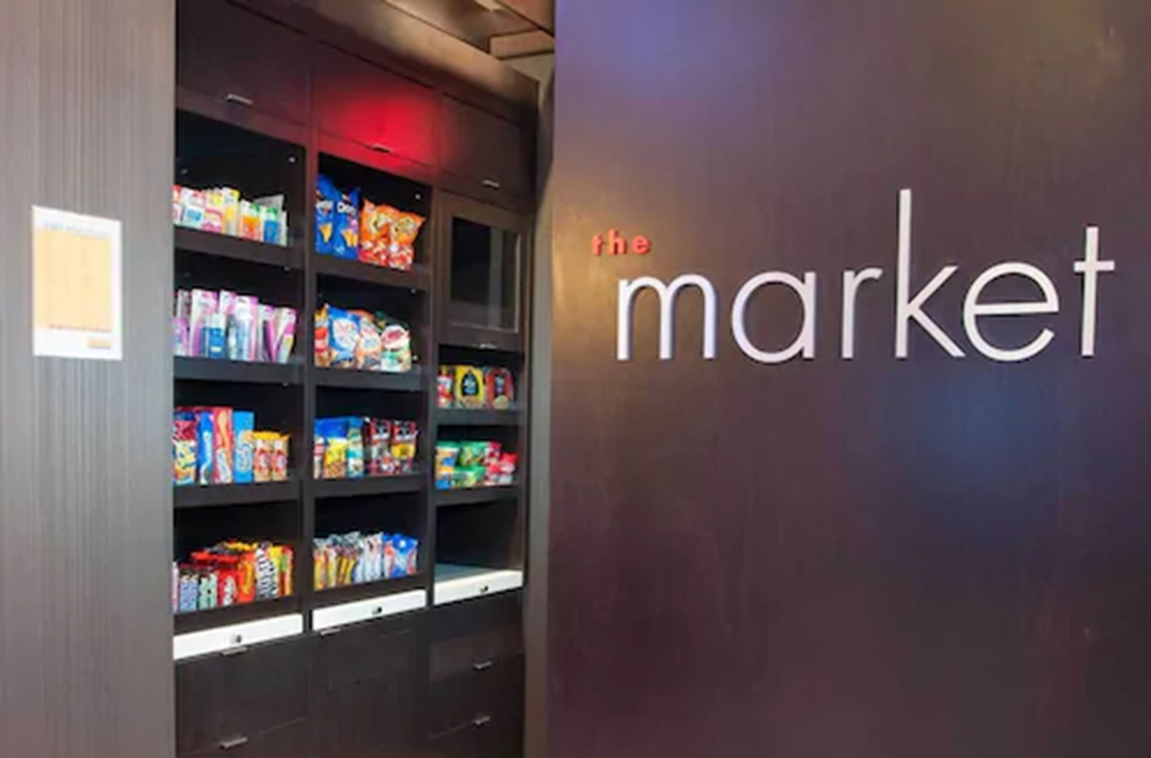 A snack display area with various packaged goods.
