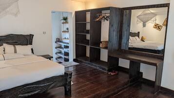 Family Apartment, 1 King Bed, Hill View | Living area | 32-inch flat-screen TV with satellite channels, TV