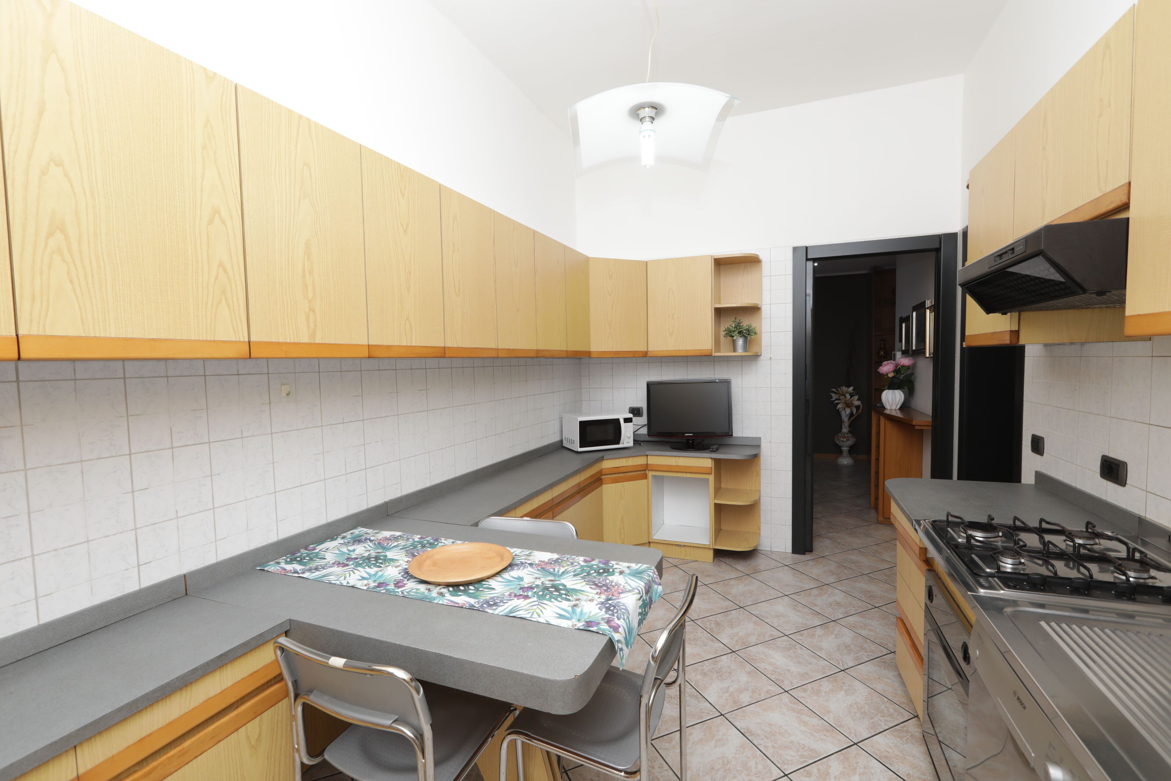 Apartamento, 2 quartos, terraço | Cozinha privada | Geladeira grande, micro-ondas, cooktop, chaleira elétrica