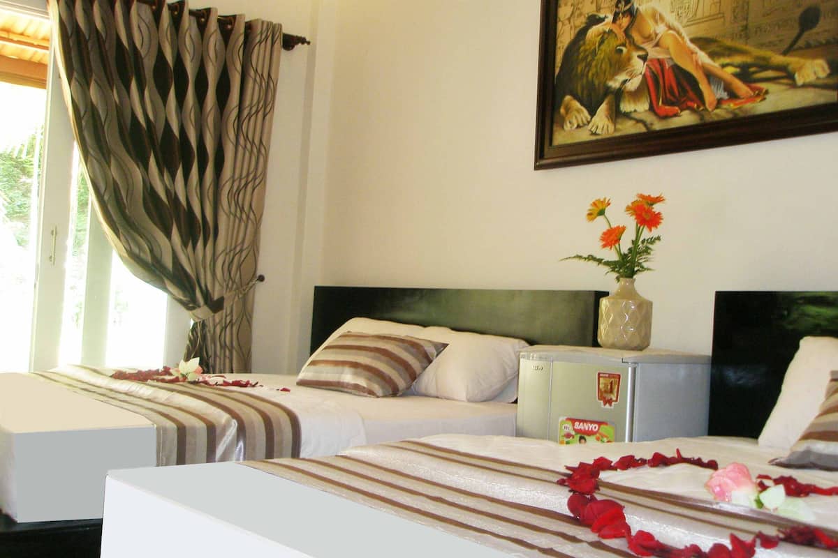 Family Bungalow, Lake View | Minibar, desk, blackout drapes, rollaway beds
