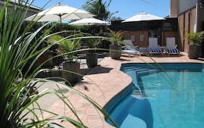 Outdoor pool, pool umbrellas, pool loungers