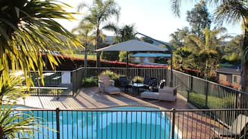 Seasonal outdoor pool, pool umbrellas, sun loungers