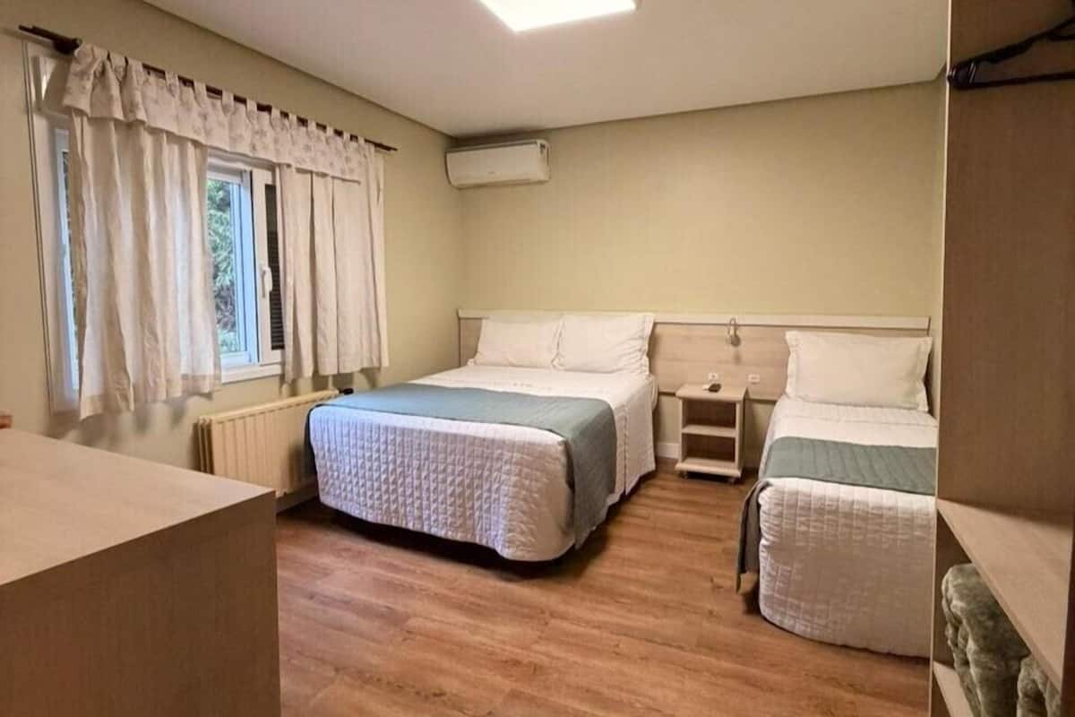 Standard Triple Room | Minibar, blackout drapes, free WiFi, bed sheets