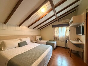 Standard Triple Room | Minibar, blackout drapes, free WiFi, bed sheets