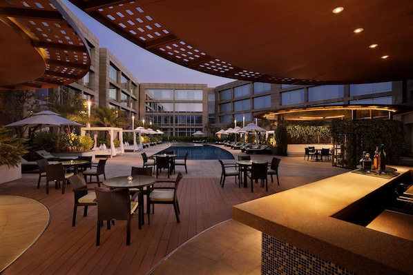 Outdoor pool, free cabanas, pool umbrellas
