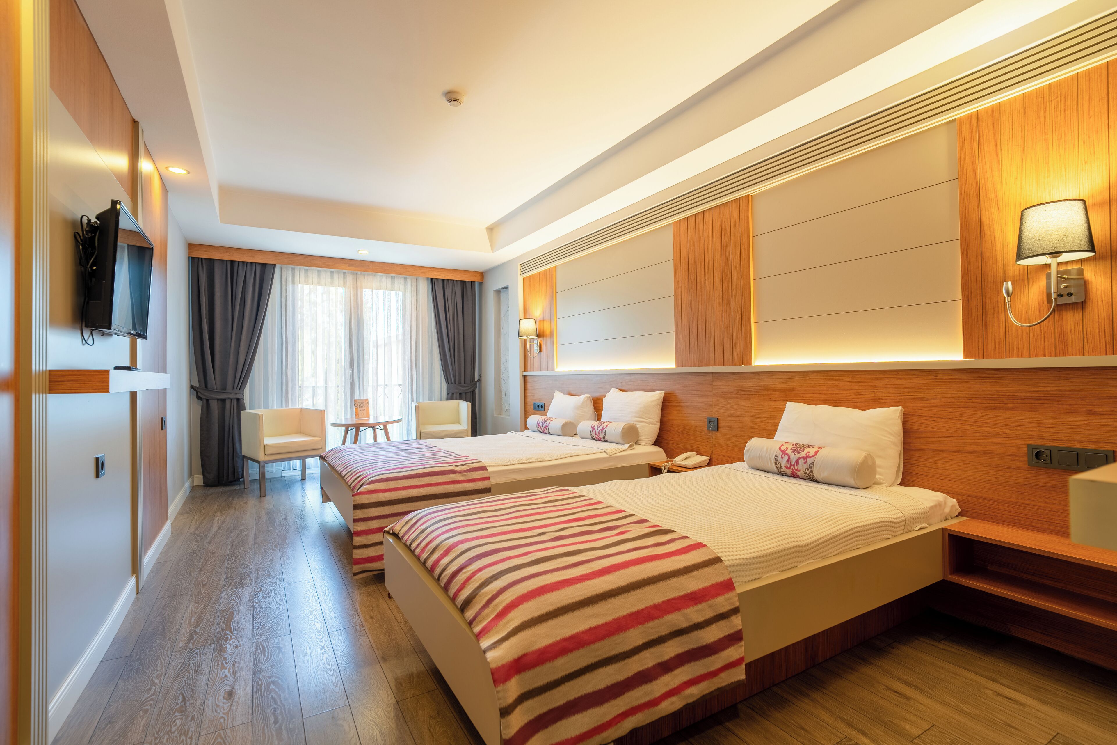 Family Triple Room | Premium bedding, minibar, in-room safe, desk
