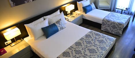 Ropa de cama de alta calidad y minibar