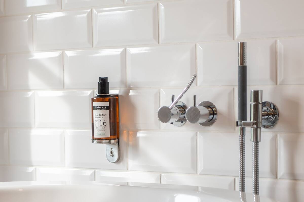 deluxe double room single use | bathroom | separate bathtub and shower, hair dryer, towels