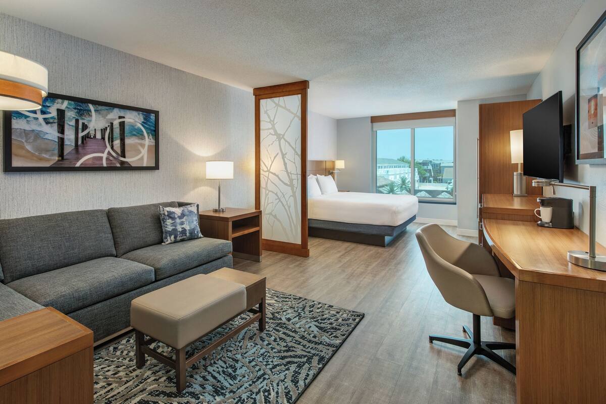 guest room, room, 1 king bed | in-room safe, desk, blackout curtains, iron/ironing board