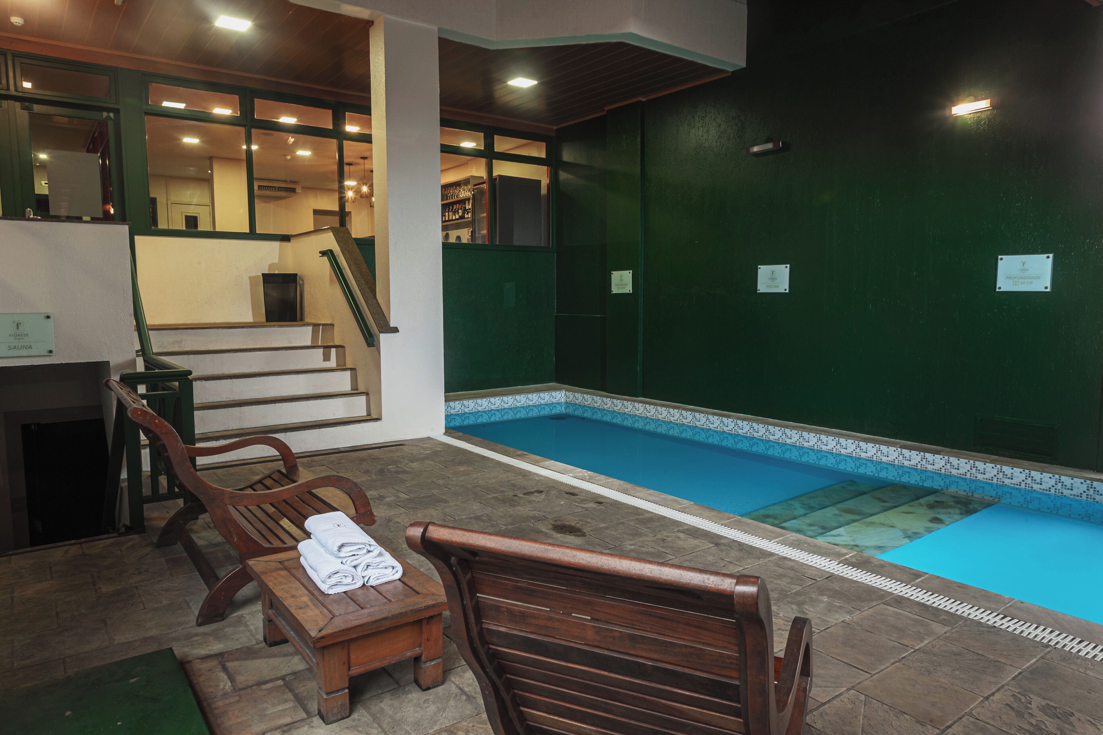 indoor pool, open 9:00 am to 10:00 pm, pool loungers