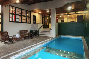 Indoor pool, open 9:00 AM to 10:00 PM, sun loungers