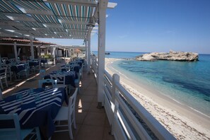 Breakfast, lunch, dinner served; Mediterranean cuisine, beach views 