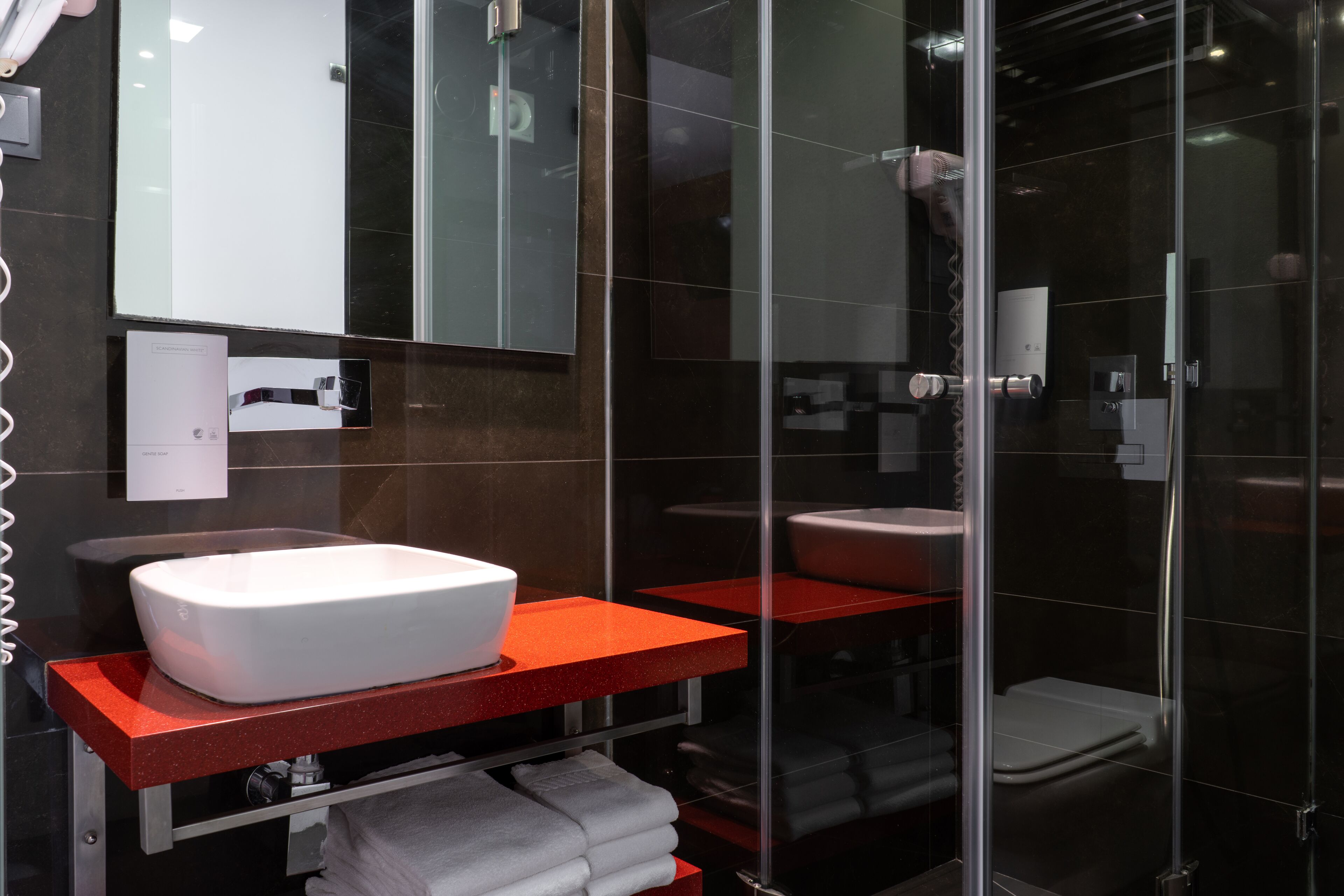 shower, free toiletries, hair dryer, towels