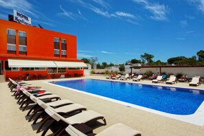 Outdoor pool, open 8 AM to 8 PM, sun loungers