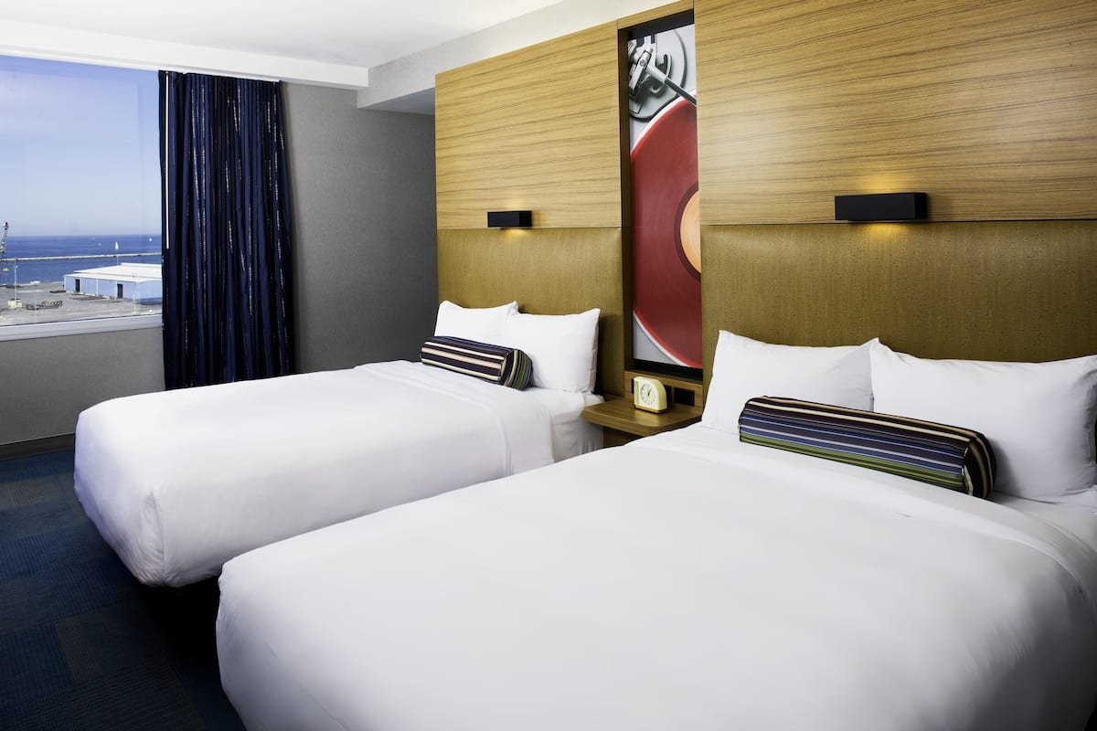Premium bedding, pillow-top beds, in-room safe, desk